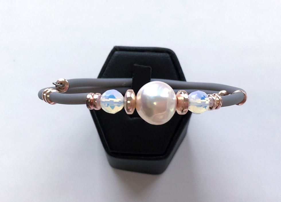 Thumbnail: Pink pearl on rubber wire bracelet