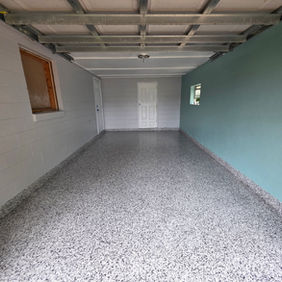 Epoxy garage coating in New Smyrna Beach FL with a durable decorative floor finish.