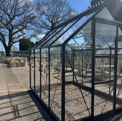 Halls ICON 6 greenhouse against a bright blue sky