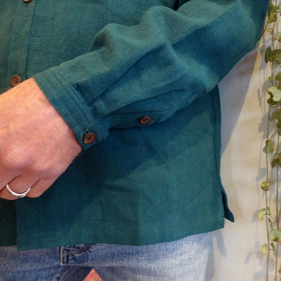Thumbnail: detail of mens shirt in bold and colourful plain woven fabric