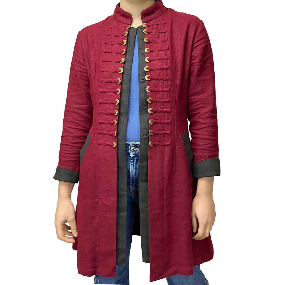 ruby red open jacket with military decorations at front and rolled back sleeves in contrasting colour