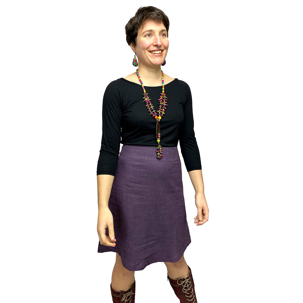 Thumbnail: woman in mauve mini skirt and black bamboo top