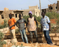 Building the foundation: L-R: Mamelaye Lo, Mame Cheikh, Mohamed Diop Hamidou Coulibaly