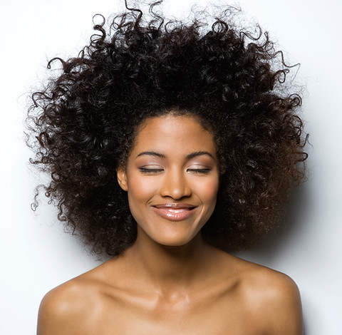 Smiling Woman with Curly H