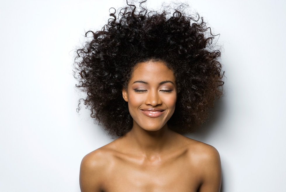 Portrait of a Smiling Woman with Curly H