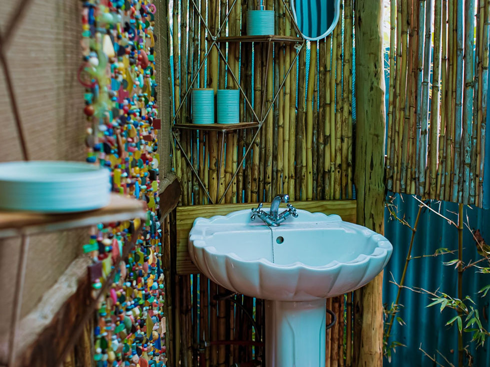 jacobsbaai-gypsy-vans-weskus-leopard-rose-outdoor-shower.jpg