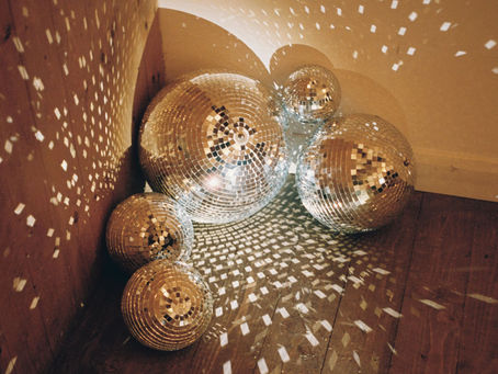 disco balls in the corner at folkerton mill wedding