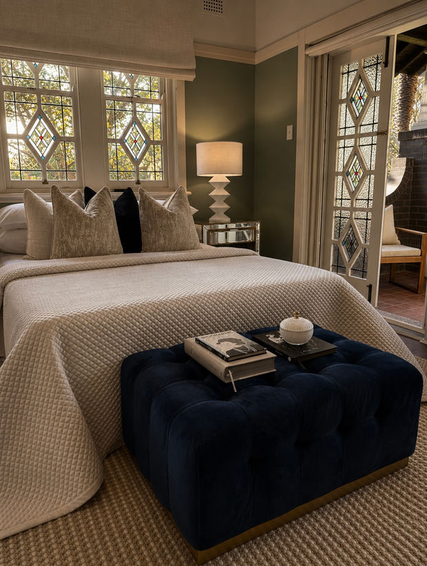 Luxury master bedroom styling bedroom in a heritage Haberfield residence styled with soft linen, layered textures and elegant contemporary furnishings.