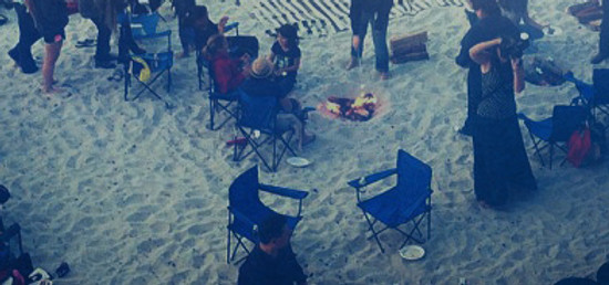 Friends camping on the beach