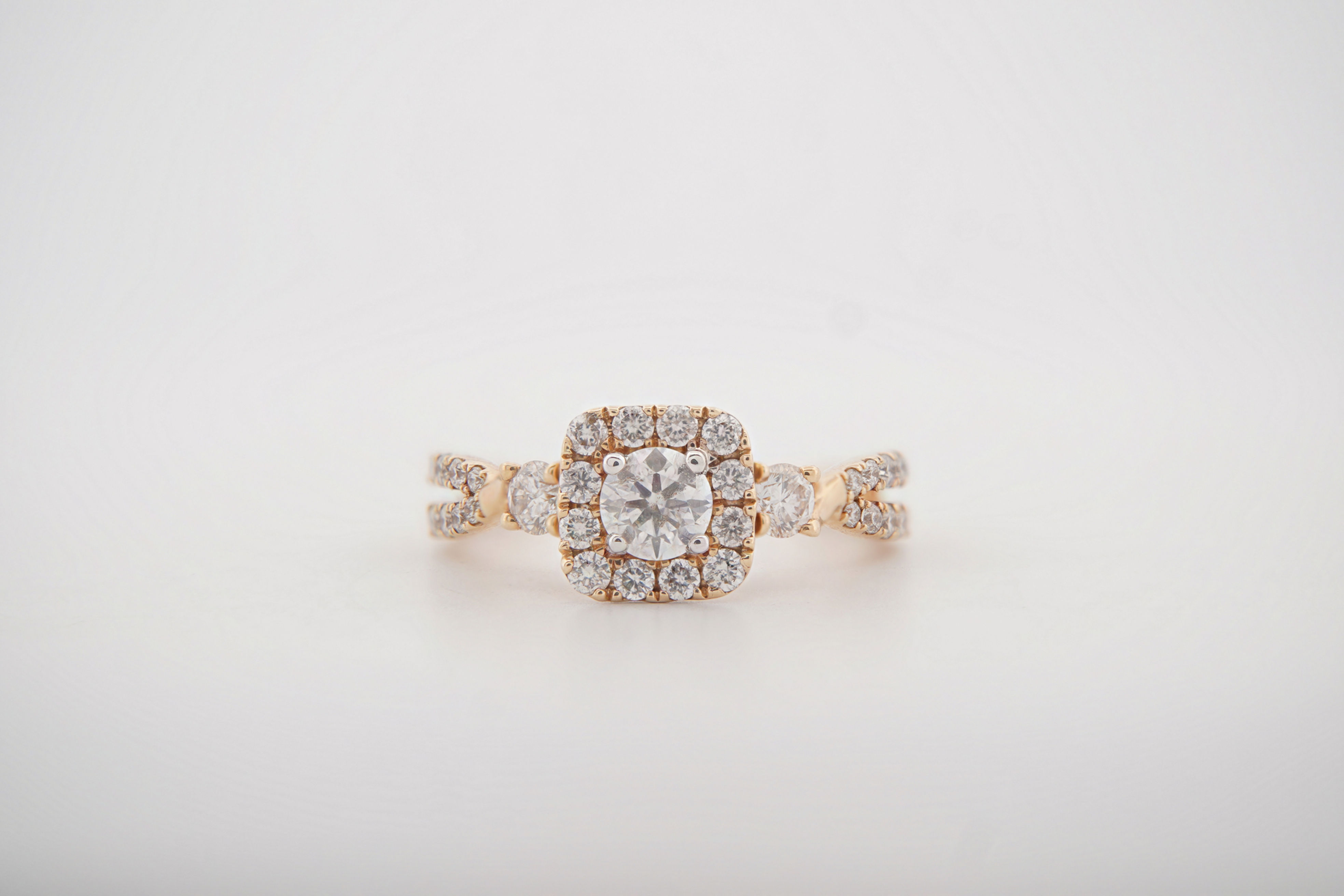 14k .87ctw Three-Stone Halo Diamond Ring