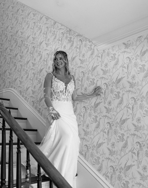 Kayla walking down steps Leece Bachman.jpg