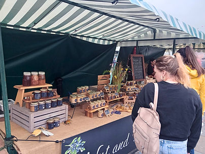 nut and leaf stand at a local farmers market