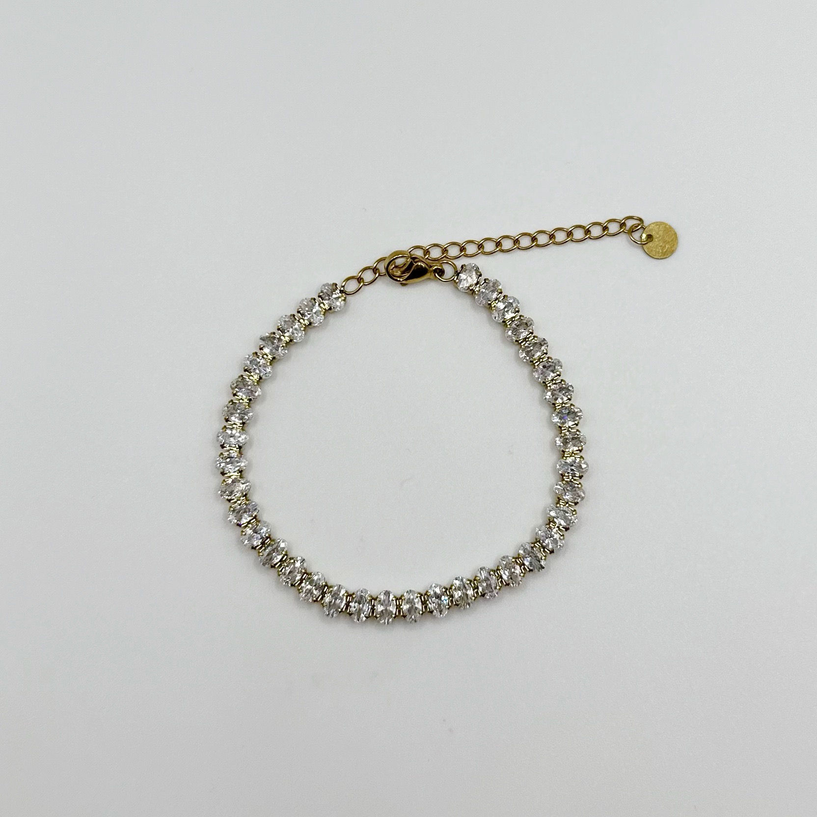 Gold Diamond Zirconia Oval Cut Tennis Bracelet