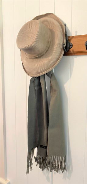 Country hat and scarf hanging up at Sam Brown Cottage, holiday accommodation Frazerview