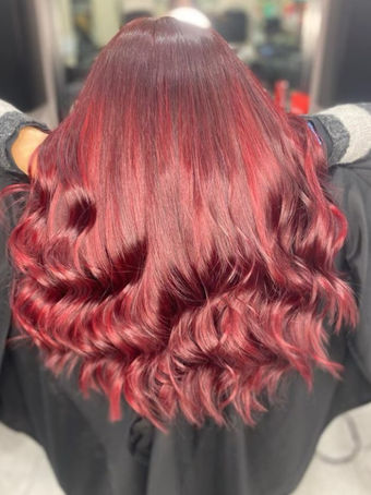 Miramide treated long shiny  red hair