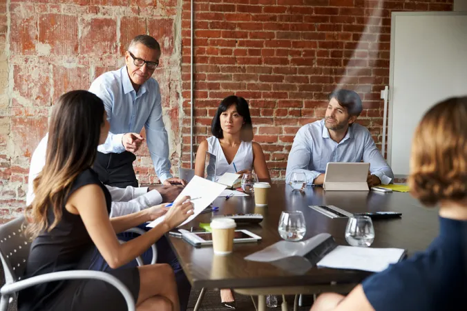 bigstock-businesspeople-meeting-in-mode-169495187.jpg.webp