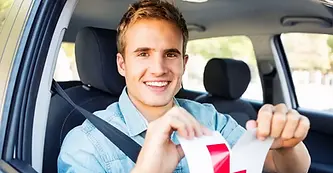 0_Happy-Man-Tearing-L-Plate-After-Passing-Driving-Test.jpg.webp