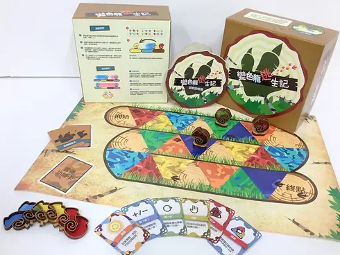 Dino Dig board game components: game board, cards, box