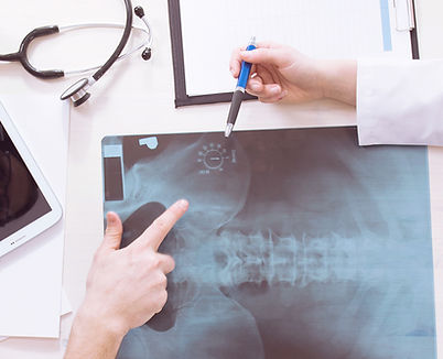 Doctors examining X-ray