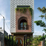 modern facade townhouse Phnom Penh minimalist exterior wood slat design