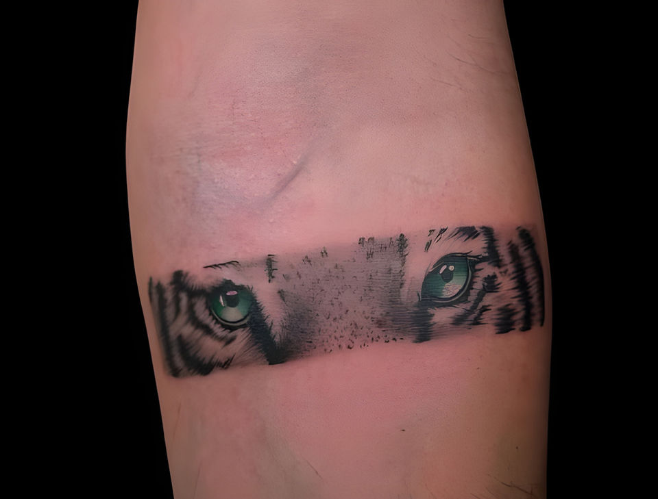 black and grey realism eyes armband tattoo forearm Chicago Mindcrusher Tattoo