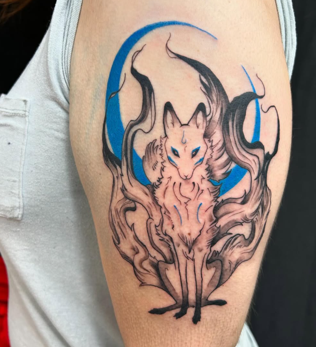 Neo-traditional wolf spirit tattoo with crescent moon.