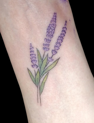 Fine line lavender flower tattoo by Mindcrusher Tattoo Edgewater Chicago