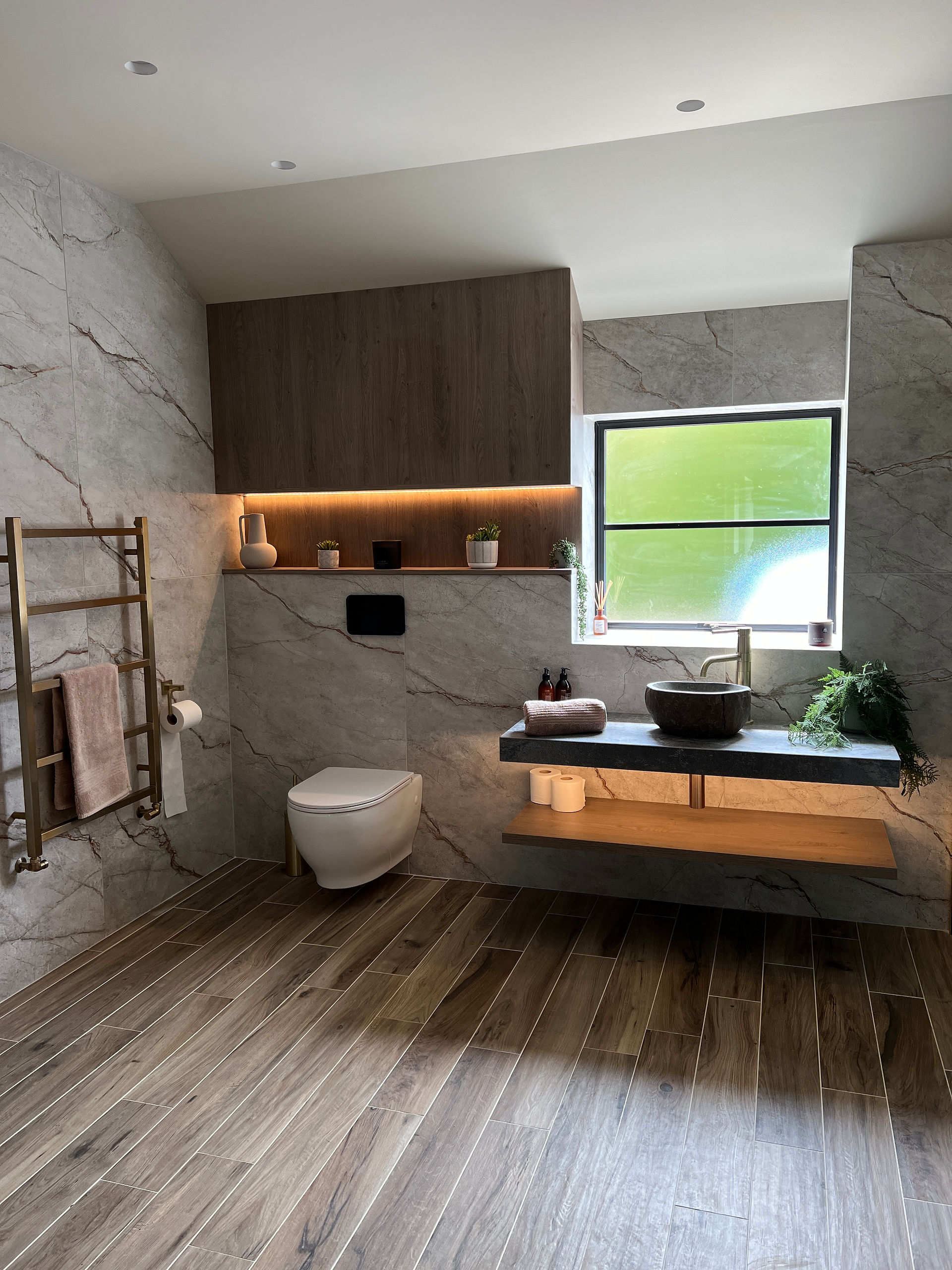 Interior designer, Yorkshire interior design, luxury home design, home renovation, design like a pro, interior design tips, home styling, lounge with a lamp, home bar, open plan living, kitchen design, family kitchen, bookcase, integrated lighting, bathroom with floating shelf, bathroom design, wine room, wine cellar, built in cabinets, wallpaper, feature wall