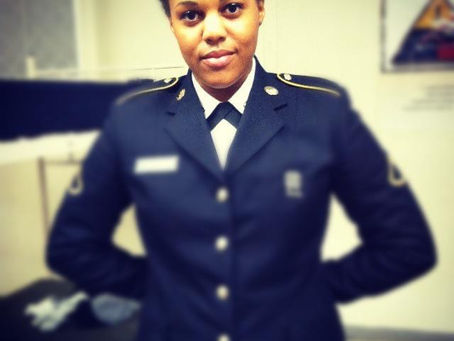 A female Soldier in Unform at Basic Training Graduation.