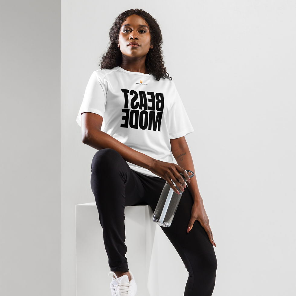 Thumbnail: Woman wearing the BEAST MODE Classic motivational workout shirt in white, sitting pose.