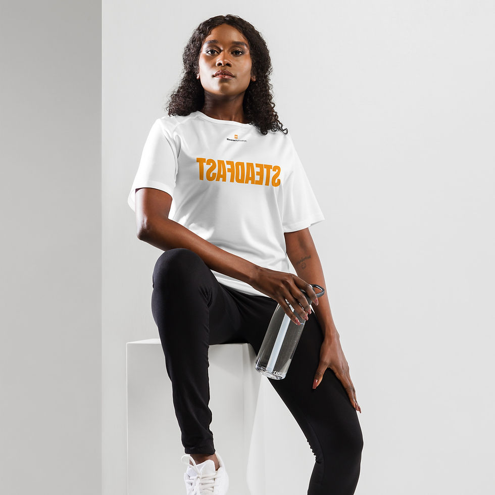 Thumbnail: Woman wearing the STEADFAST Ember motivational workout shirt in white, sitting pose.
