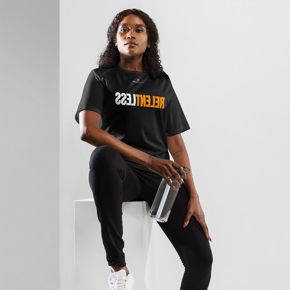 Thumbnail: Woman wearing the RELENTLESS BreakPoint motivational workout shirt in black, sitting pose.