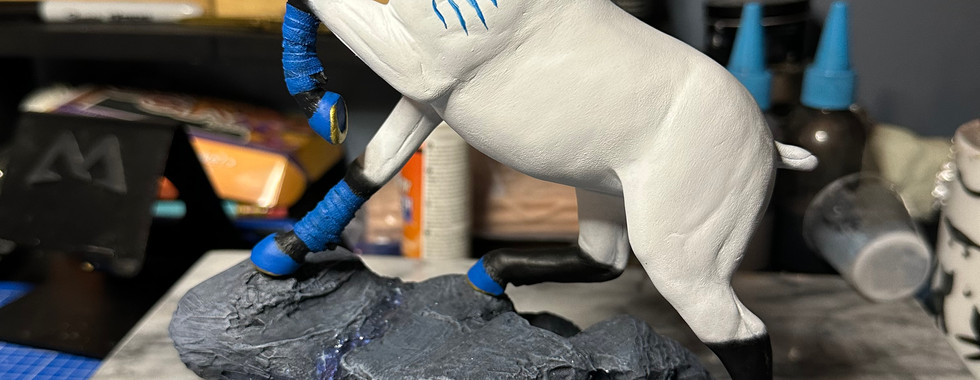 white horse on rocks polymer clay sculpture