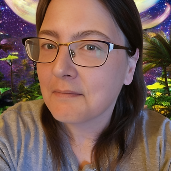 Woman wearing glasses, looking at the camera, with a colorful background.