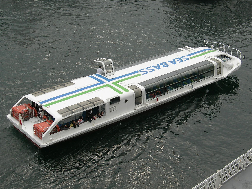 Yokohama Sea Bass passenger boat crossing the harbour between waterfront stops