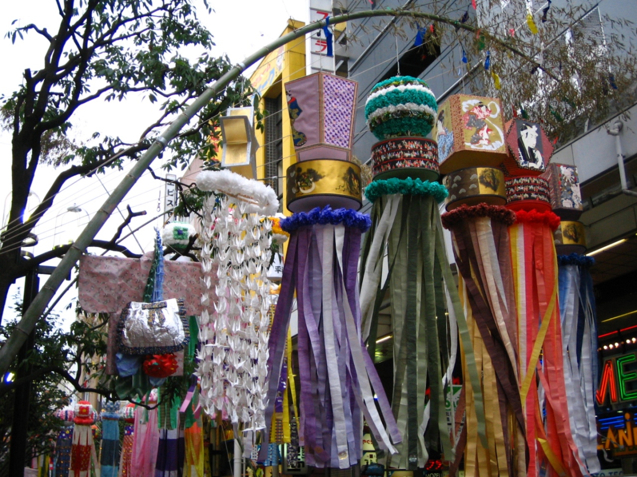 Large Sendai Tanabata streamers inside a shopping arcade on day six of a Tohoku summer festival route