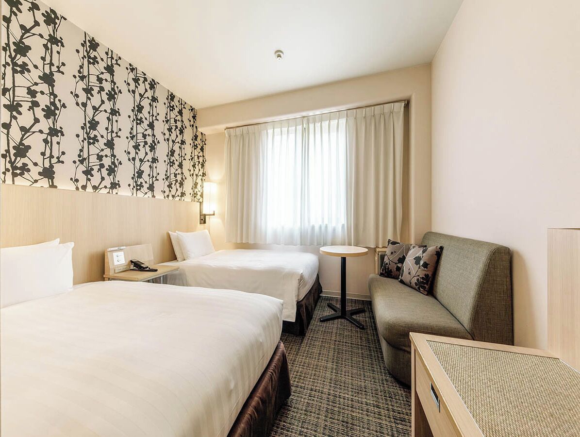 Twin room at Nishitetsu Resort Inn Beppu