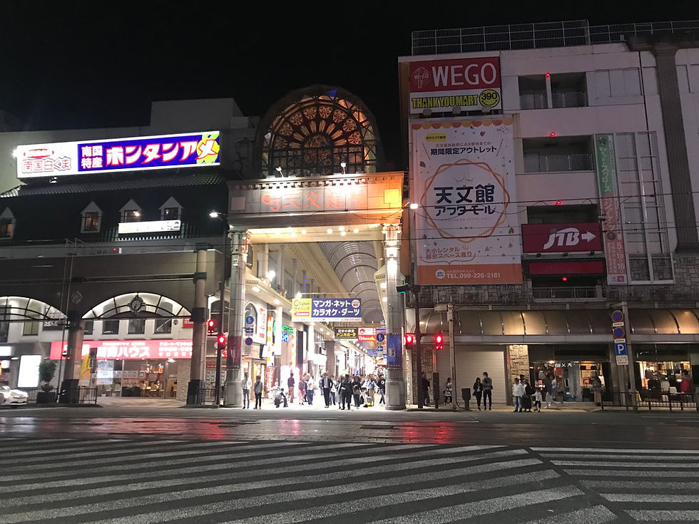 Tenmonkan G3 shopping arcade at night in Kagoshima, showing the dining and nightlife atmosphere of the downtown hotel base