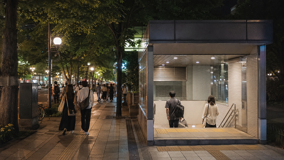 Night walking route and generic subway entrance after an outdoor summer event in central Sapporo