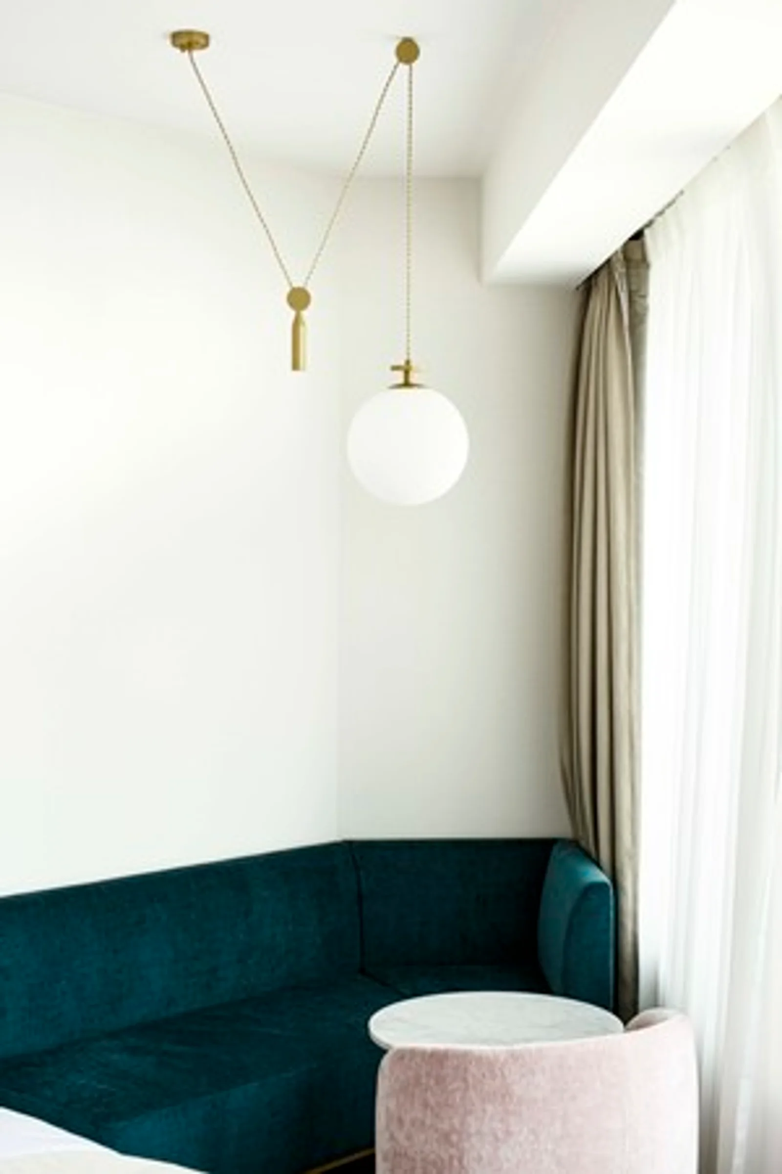 Seating and rest space inside a THE KNOT HIROSHIMA guest room