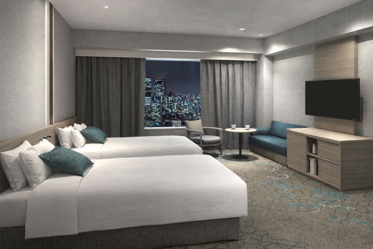 Hotel Granvia Okayama Premium Superior Twin 객실의 트윈 침대와 휴식 공간