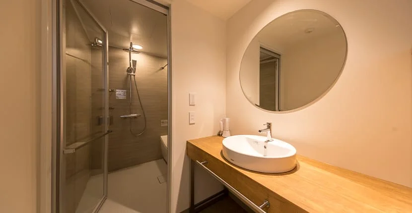 Separate washbasin and bathroom in a Tokyu Stay Okinawa Naha family room