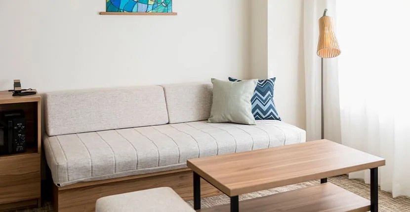 Sofa and living area in a family room at Tokyu Stay Okinawa Naha