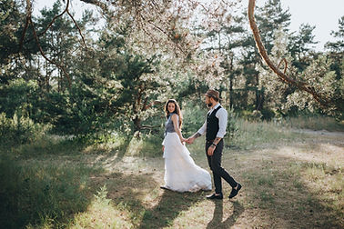 Bride and groom at boho wedding venue
