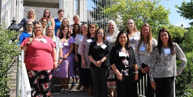 Recent graduates of Opportunities to Nursing Excellence. Photo: American Senior Communities