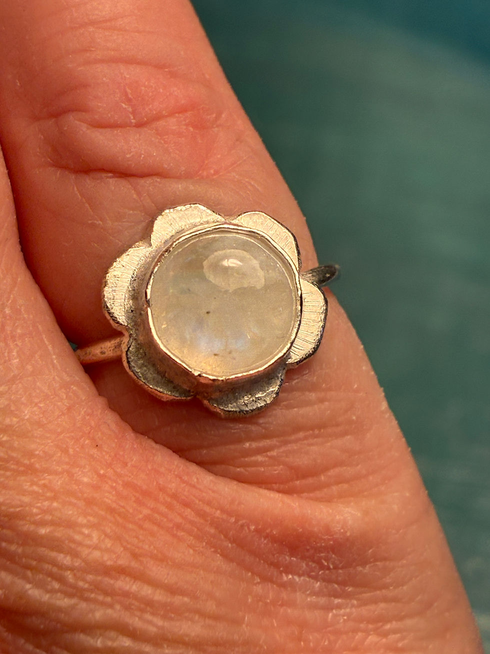 Thumbnail: Halo flower rainbow moonstone ring