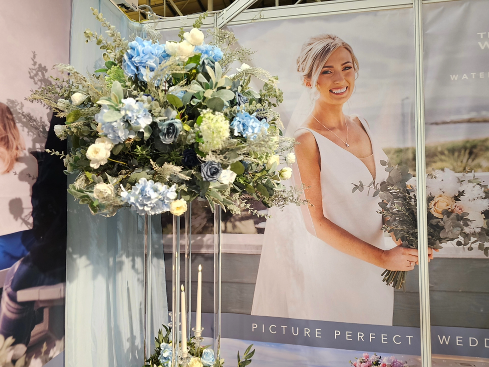 Thumbnail: Charlotte arrangements on columns with candles and garlands 