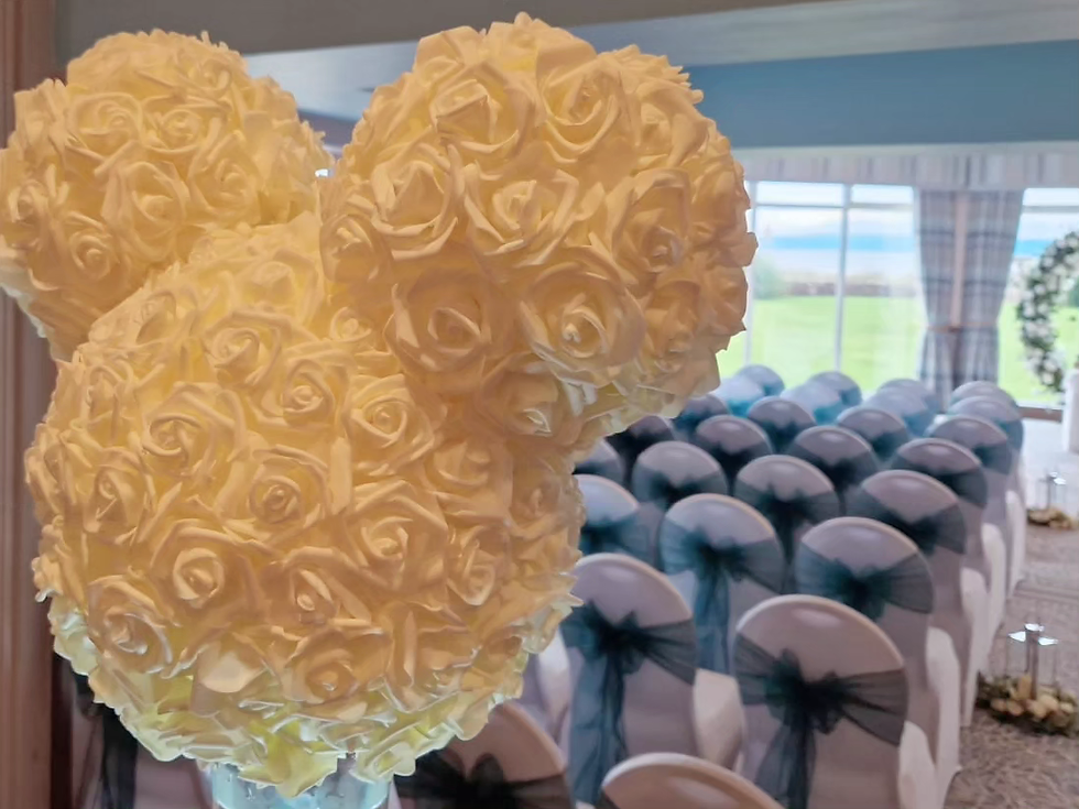 Thumbnail: Mickey rose heads on conical vases