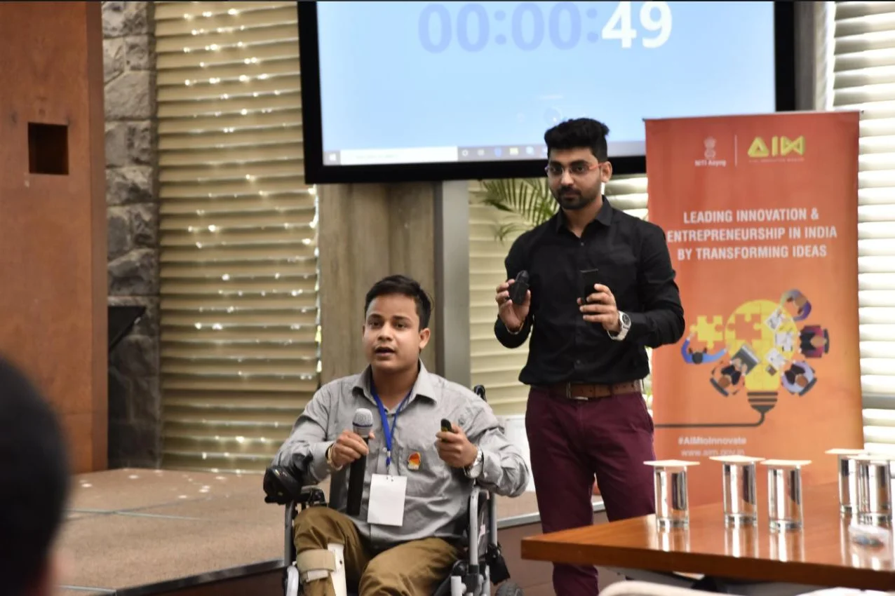 person with disabilities from india speaking at an event