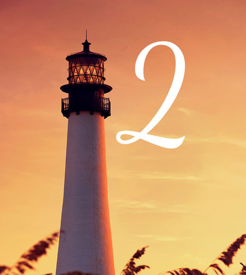 A serene lighthouse at sunset, symbolizing the guidance and professional courtesy outlined in the Bay Renovations Customer Bill of Rights.
